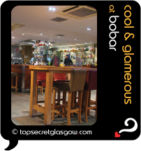 Top Secret Glasgow lozenge showing bar interior. Caption: cool & glamerous