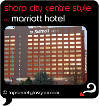 Top Secret Glasgow Quote Bubble showing hotel exterior from main road.
Caption: sharp city centre style