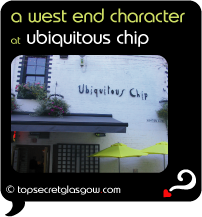 Top Secret Quote Bubble in black, with photo of exterior of Ubiquitous Chip, white walls with black trims, umbrellas in Ashton lane. 'a west end character'