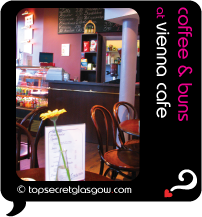 Top Secret Glasgow Quote Bubble showing interior cafe decor.
Caption: coffee & buns