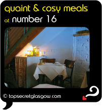 Top Secret Glasgow QUote Bubble showing cute table interior, under staircase.
Caption: quaint & cosy meals