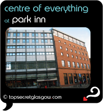 Top Secret Glasgow Quote Bubble showing hotel exterior in sun.
Caption: centre of everything