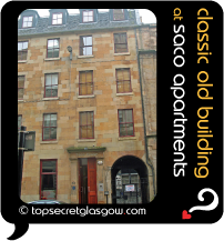 Top Secret Glasgow lozenge showing building from across street. Caption: classic old building