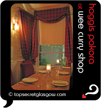 Top Secret Glasgow Quote Bubble showing interior of tiny dining room, with tartan curtains.
Caption: haggis pakora